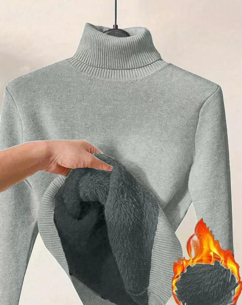 AURORE LUXURE Women's Long Sleeve Turtle Neck Fleece Lined Slim Fit Sweater Pullover Tops in gray, with plush fleece lining revealed by hand.
