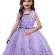 DreamHigh Flower Girl Dress for 3-10 Years Old Girls by AURORE LUXURE, worn by a smiling girl, featuring a lovely purple embroidered dress with a tulle skirt and pearl accents.