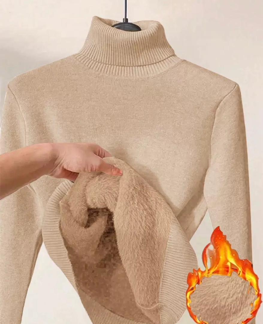 AURORE LUXURE Women's Long Sleeve Turtle Neck Fleece Lined Slim Fit Sweater Pullover Tops in beige with soft fleece lining showcased by hand.