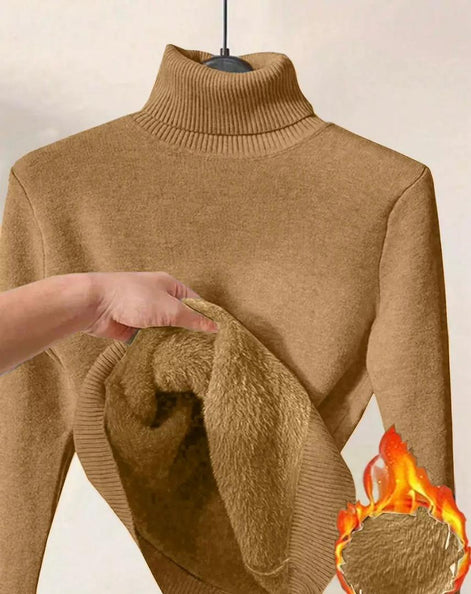 AURORE LUXURE Women's Long Sleeve Turtle Neck Fleece Lined Slim Fit Sweater Pullover Tops in brown, emphasizing soft fleece lining shown by hand.