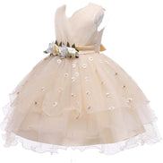 Detailed view of a cream dress for girls, from the Baby Girls Dresses Summer collection.