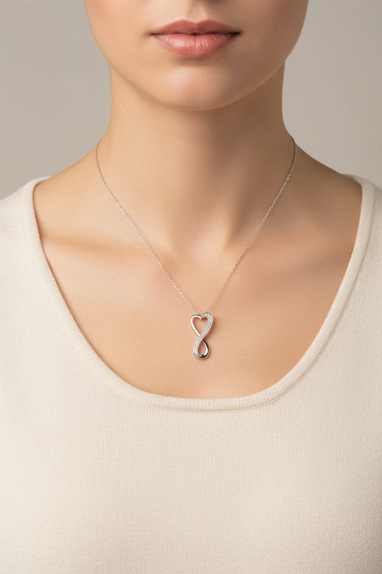 Delicate Diamond Infinity Heart 18” Pendant Necklace in Sterling Silver (1/10 ct. t.w.)”